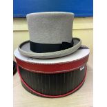 HAT BOX CONTAINING A GREY TOP HAT SIZE 7 1/4 BY WINDMILL TEXTILE MARKET
