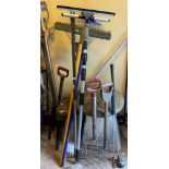 SELECTION OF GARDEN TOOLS INCLUDING RAKES AND FORKS