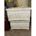 PAIR OF SQUARE SECTION STONE PLANTERS DECORATED WITH FIGURES 37CM W APPROX