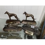 FOUR RESIN PATINATED GREYHOUND/WHIPPET RACE TROPHIES