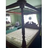 DARK WOOD FOUR POSTER DOUBLE BED WITH CARVED AND ENTWINED VINE DETAIL