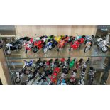 TWO SHELVES OF PLASTIC SCALE MODELS OF MOTORCYCLES