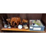 SELECTION OF CARVED WOOD ANIMAL FIGURES INCLUDING ELEPHANTS AND MANTA RAY ON STAND,