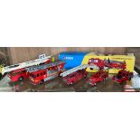 SHELF OF DIECAST MODEL FIRE ENGINES AND FIRE WAGONS BY CORGI AND LESNEY,