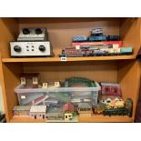 TWO SHELVES OF MODEL RAILWAY BUILDINGS AND BRIDGES,