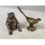 BASE METAL MODEL OF A PHEASANT AND AN UNMARKED WHITE METAL NOVELTY MODEL OF A SEATED BEAR PLACE