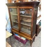 EARLY 19TH CENTURY MAHOGANY GLAZED TWO DOOR CABINET ON STAND WITH TAPERED LEGS AND CASTORS