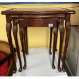 NEST OF MAHOGANY SPIDER LEG TABLES