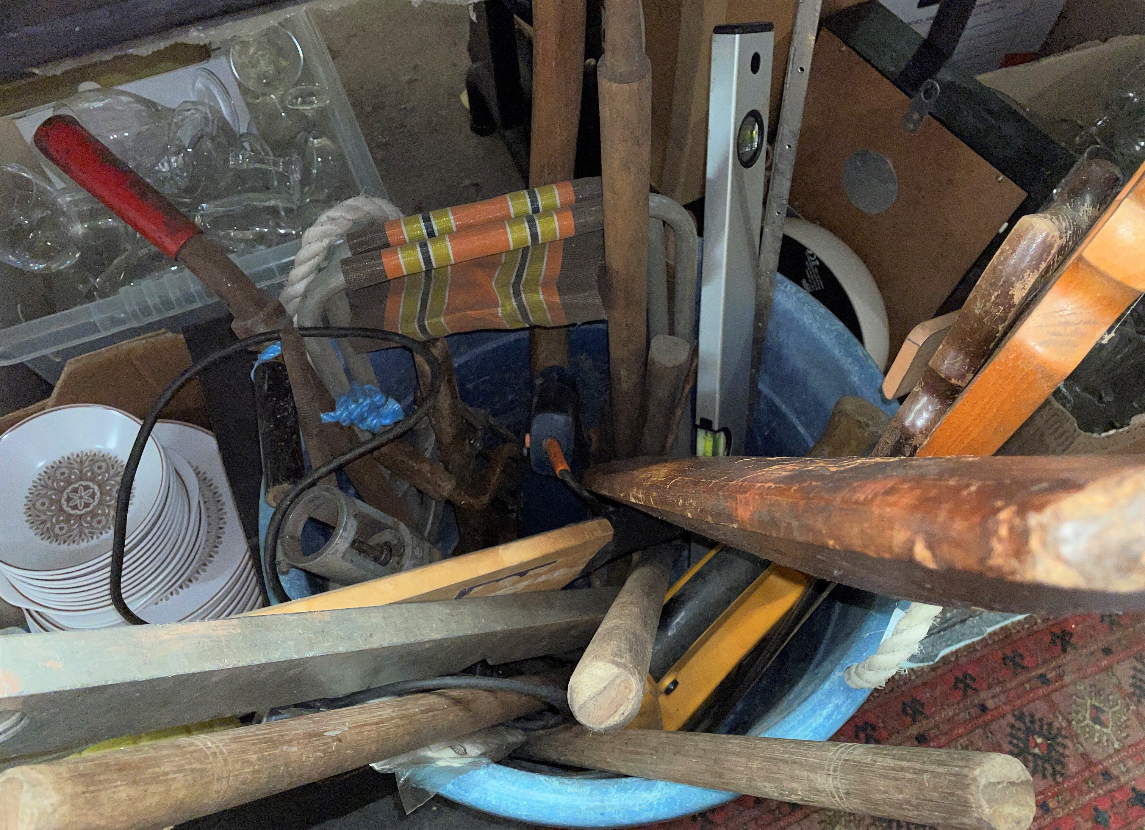 ROPE HANDLED BUCKET OF MIXED TOOLS - SAWS, SPIRIT LEVELS, HAMMERS,