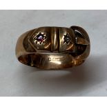 9CT ROSE GOLD BUCKLE RING INSET WITH TWO STONES SIZE R, 1.