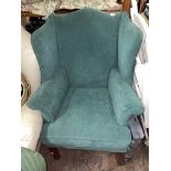 GREEN VELOUR UPHOLSTERED WING ARMCHAIR