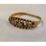 UNMARKED YELLOW METAL AND FIVE STONE DIAMOND RING SIZE M/O, 2.