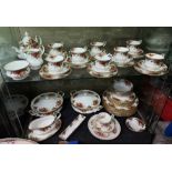 TWO SHELVES OF ROYAL ALBERT OLD COUNTRY ROSES,