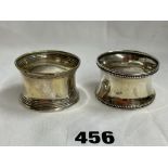 TWO SILVER NAPKIN RINGS