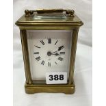 FRENCH BRASS CASED CARRIAGE CLOCK WITH KEY,