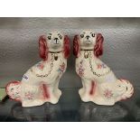 PAIR OF REPRODUCTION STAFFORDSHIRE SEATED SPANIELS