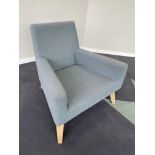 CONTEMPORARY PALE BLUE FABRIC BEECH LEGGED ARMCHAIR AND CUBE STOOL