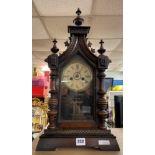 A VICTORIAN WALNUT STEEPLE MANTLE CLOCK