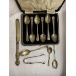 CASED SET OF SILVER TEASPOONS ALONG WITH A PAIR OF SILVER TALON SUGAR TONGS,