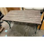 GREEN PAINTED CAST IRON ENDED SLATTED GARDEN TABLE WIDTH 128CM,