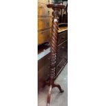 MAHOGANY WRYTHEN AND CARVED TORCHERE STAND