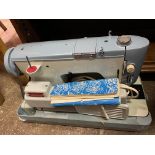 ELECTRIC CASED SEWING MACHINE