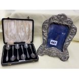 SILVER EMBOSSED EASEL BACKED PHOTO FRAME AS FOUND AND CASE SET OF SIX STERLING SILVER TEA SPOONS