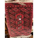 RED PATTERED RUG (50CM X 75CM)