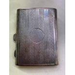 BIRMINGHAM SILVER CIGARETTE CASE WITH VERTICLE BANDS AND ENGINE TURNED DECORATION 2.
