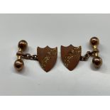 A PAIR OF 9CT GOLD SHIELD SHAPED CUFFLINKS, 4.