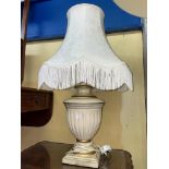 CREAM PAINTED POTTERY OVOID TABLE LAMP WITH CREAM FRINGED SHADE