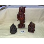 THREE HARD WOOD ORIENTAL CARVINGS