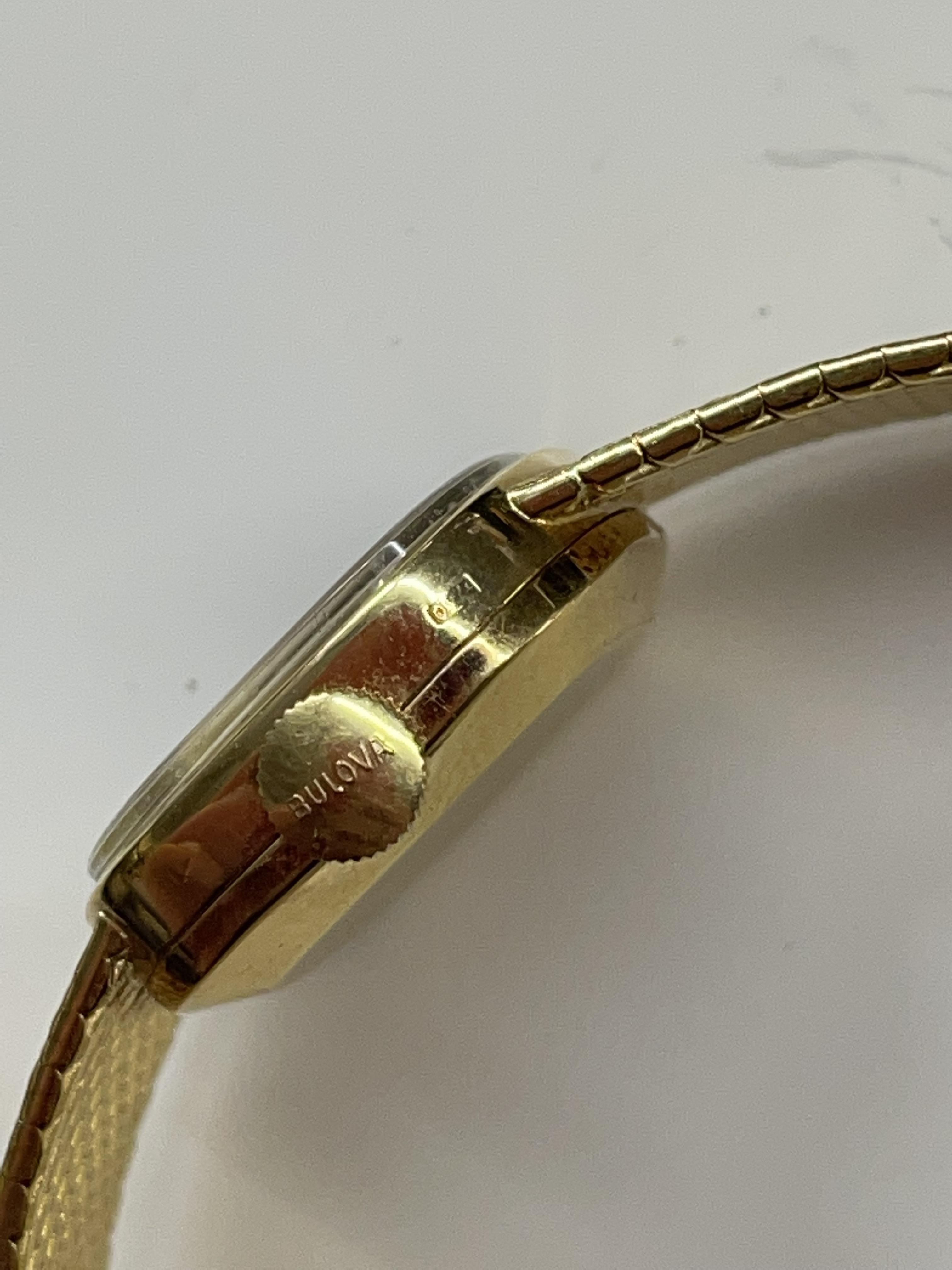 LADIES BULOVA BARK EFFECT GOLD CASED WRIST WATCH AND STRAP STAMPED 750, 35. - Image 2 of 4