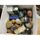 BOX OF POLISHED AGATE EGG SHAPES AND FOSSILS