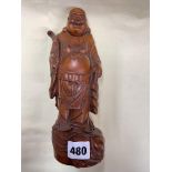 HARDWOOD CARVING OF A CORPULENT MONK 23CM HIGH