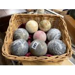 WICKER BASKET OF POLISHED AGATE CARPET BOWLS