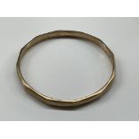 YELLOW METAL BANGLE 17.