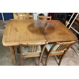MAHOGANY EXTENDING DINING TABLE AND FOUR VERTICAL SLAT BACK DINING CHAIRS