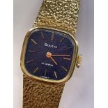 LADIES BULOVA BARK EFFECT GOLD CASED WRIST WATCH AND STRAP STAMPED 750, 35.