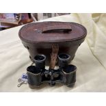 PAIR OF FIRST WORLD WAR JOHN AND BENNETT GREEN BINOCULARS 1917 IN LEATHER CASE