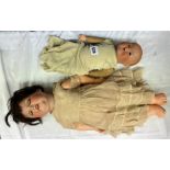 AM996 GERMAN BISQUE HEADED DOLL AND A SMALL AM BISQUE HEADED COMPOSITE CRYING DOLL