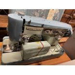 ELECTRIC CASED SEWING MACHINE