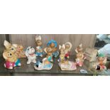 SHELF OF PENDELFIN RABBIT FIGURE GROUPS