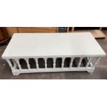 WHITE PAINTED PINE OBLONG COFFEE TABLE WITH ARCHED BALUSTRADE SPINDLES