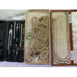 TWO PEARL NECKLACES AND A TECHNICAL DRAWING SET