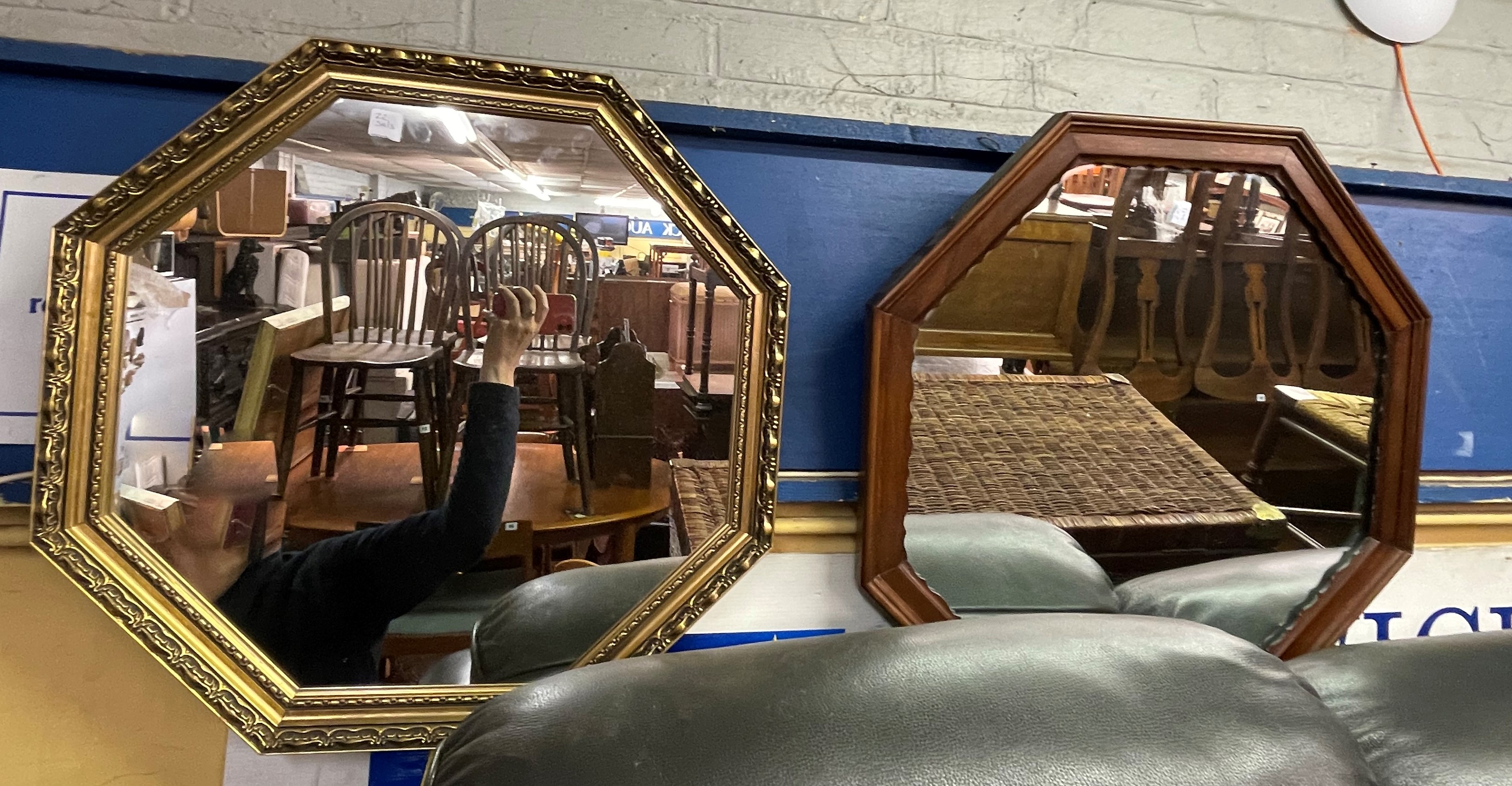 GILT OCTAGONAL MOULDED FRAMED MIRROR AND A DARK WOOD FRAMED OCTAGONAL MIRROR