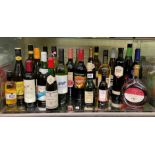 SHELF OF VARIOUS BOTTLED WINE