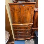 YEW CROSS BANDED BOW FRONT DRINKS CABINET WITH PULL OUT SLIDE