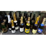 SHELF OF BOTTLES OF CHAMPAGNE AND SPARKLING WINES