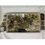 BOX OF ASSORTED COSTUME JEWELLERY, CHAINS, BROOCHES, BEADS, BADGES RELATING TO COMMANDO REGIMENTS,